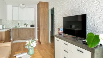 Apartamento, 1 quarto, sacada | Sala de estar
