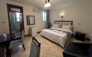 Standard Double Room | Egyptian cotton sheets, premium bedding, down comforters, pillowtop beds - Nejobugg palace hotel (Arusha)
