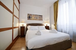 2 dormitorios, tabla de planchar con plancha, wifi gratis y ropa de cama
