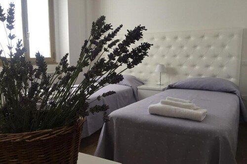 Itaka - Camera Deluxe Matrimoniale/doppia con Letti Singoli