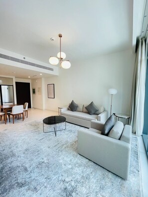 Deluxe Apartment, Bay View | Living area | LCD TV - Marina Vista Luxury Breathtaking Views (Dubai)