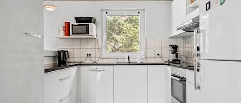 Réfrigérateur, four, plaque de cuisson, lave-vaisselle