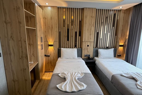 Habitación Deluxe con 2 camas individuales | Minibar, wifi gratis, ropa de cama