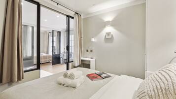 2 bedrooms, desk, iron/ironing board, travel cot