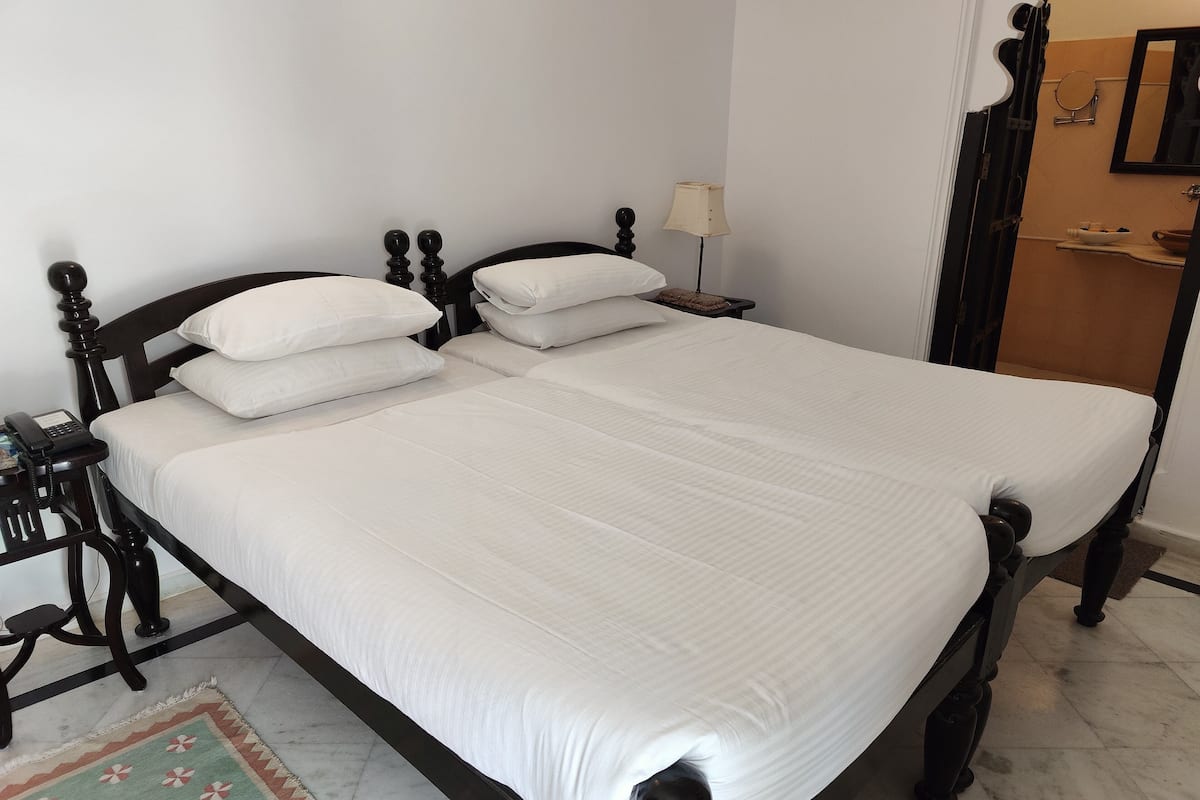 Habitación estándar | 1 dormitorio y colchones Select Comfort