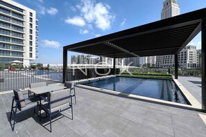 Outdoor pool - Modern 1BR 15th Floor Palace Residence (Dubai)