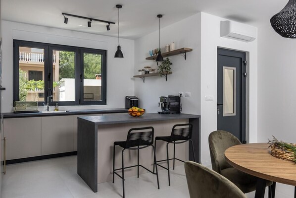 Microwave, dishwasher, coffee/tea maker, highchair