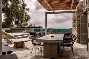 Outdoor dining - 2 Bedroom Villa with Private  Glass Pool & Shared Infinity Pool, Gym, Pool Bar (Mykonos)