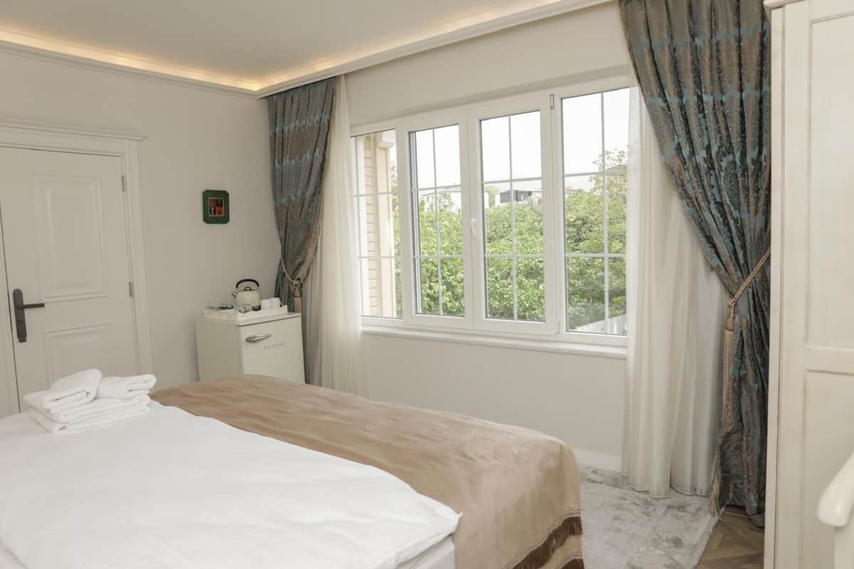 Chambre Standard Double ou avec lits jumeaux, vue jardin