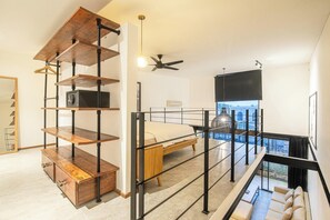 1 bedroom, desk, iron/ironing board, travel crib