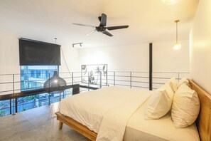 1 bedroom, desk, iron/ironing board, travel crib