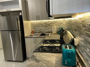 Fridge, microwave, oven, stovetop