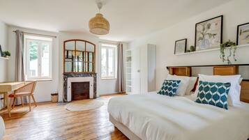 Premium bedding, blackout curtains, iron/ironing board, free WiFi