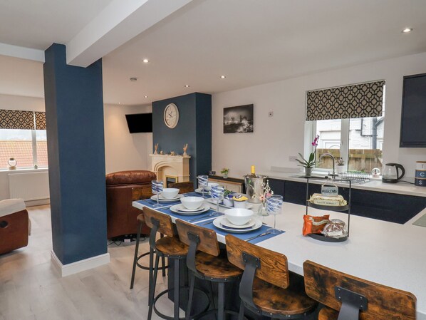 Fridge, electric kettle, cookware/dishes/utensils