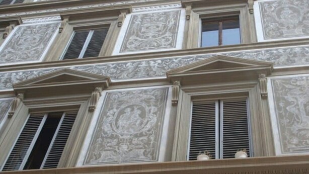 A multi-story building with ornate architectural details, including decorative moldings and window shutters. - Piazza santa croce, uffizzi, luxury apartment in historic building  (Firenze)