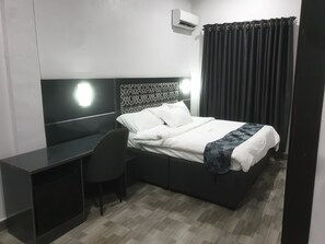 Individually decorated, individually furnished, desk, laptop workspace - Downunder Suites (Abuja)