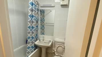 Combined shower/tub, deep soaking tub, hair dryer, towels