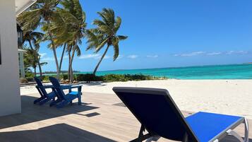 On the beach, sun loungers, beach towels