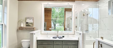 Shower, hair dryer, towels, soap
