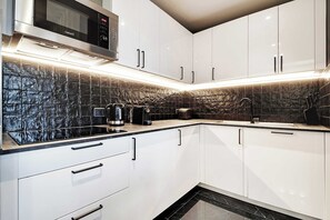 Family Apartment, City View | Private kitchen | Fridge
