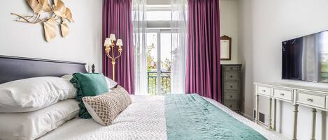 1 bedroom, desk, iron/ironing board, travel crib