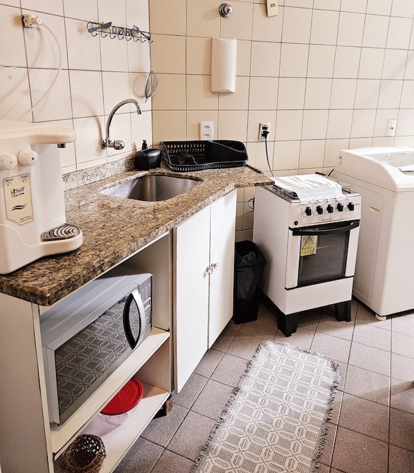 Microwave, stovetop, coffee/tea maker, electric kettle