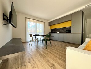 Superior Apartment | Living area | TV