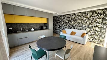 Superior Apartment | Living area | TV