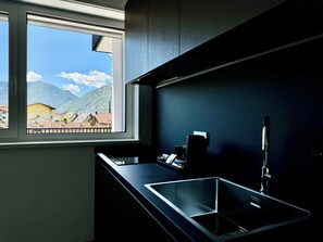 Superior Apartment | Private kitchen | Full-size fridge, oven, dishwasher, cookware/dishes/utensils