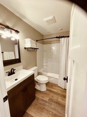 Hair dryer, towels, soap, shampoo