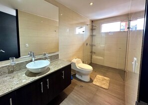 Shower, hair dryer, towels, soap