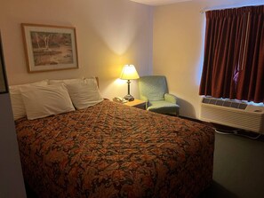 Basic Single Room | Blackout drapes, iron/ironing board, free WiFi, bed sheets