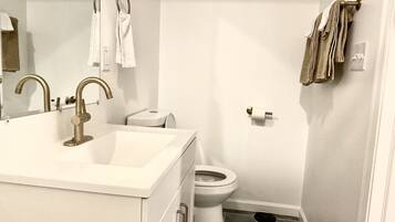 Hair dryer, towels, soap, toilet paper