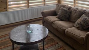 Comfort cottage | Woonruimte | Flatscreentelevisie