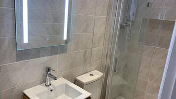 Hair dryer, bidet, towels, soap