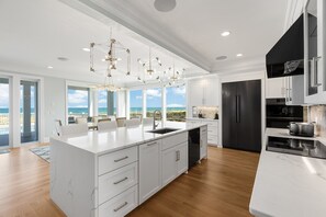 Fridge, microwave, oven, stovetop - NEW! Ocean Front luxurious 6 bedroom home Pool, Elevator, and on the Beach!  (Kure Beach)