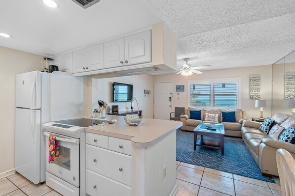 Fridge, microwave, oven, stovetop - Gulf-Front Sunset Beach Condo: Spectacular Sunsets, Steps to Beach, Free Parking (Treasure Island)