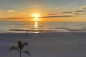 On the beach, sun loungers, beach towels