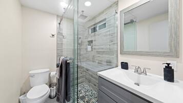 Hair dryer, towels, soap, shampoo