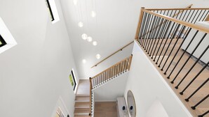 A modern staircase with wooden railings and a light wood finish floor. - NEW Villa Mare LUX Sleeps 12 l Heated Pool l 2 Masters (Naples)