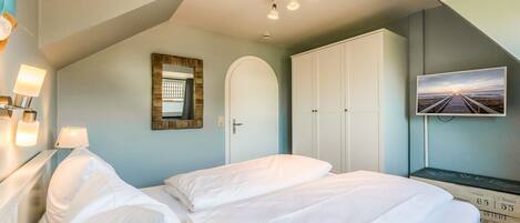 2 quartos, cofres nos quartos, ferros/tábuas de passar roupa, Wi-Fi