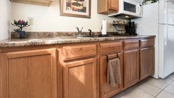 Fridge, microwave, coffee/tea maker, toaster