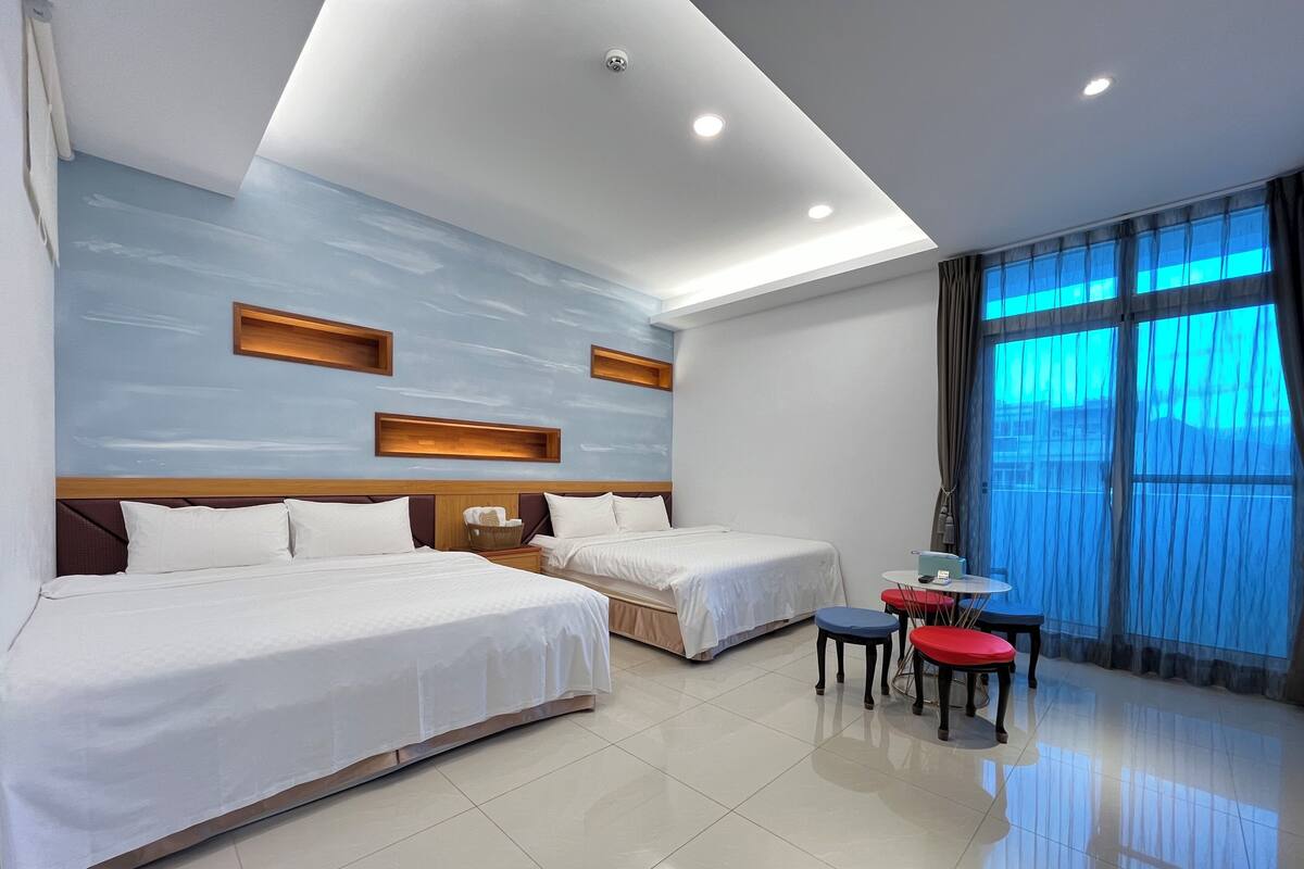 Standard Quadruple Room | Laptop workspace, blackout drapes, soundproofing, free WiFi