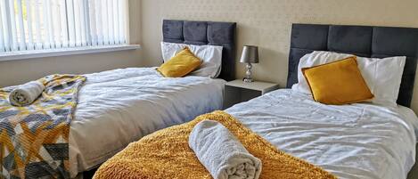 3 slaapkamers, een strijkplank/strijkijzer, wifi, beddengoed