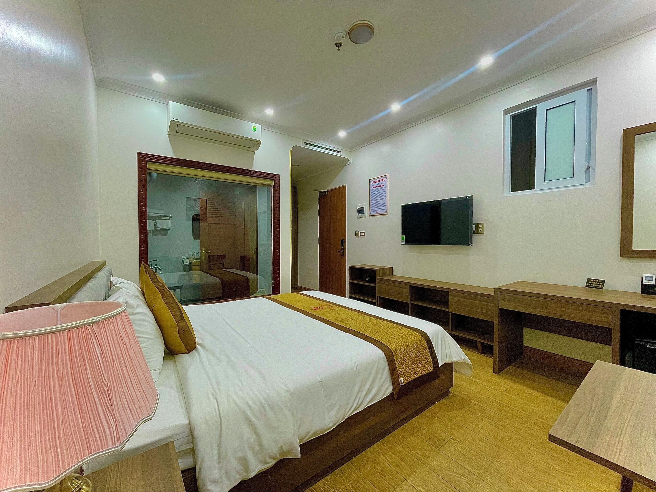City Double Room Single Use | Premium bedding, free minibar items, desk, laptop workspace