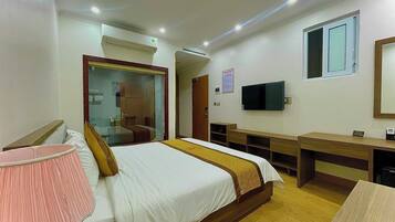 City Double Room Single Use | Premium bedding, free minibar items, desk, laptop workspace