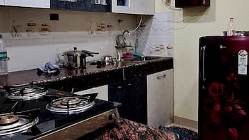 Fridge, stovetop, dishwasher, electric kettle
