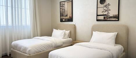 Design Apartment, 3 Bedrooms | 3 bedrooms, blackout drapes, iron/ironing board, free WiFi