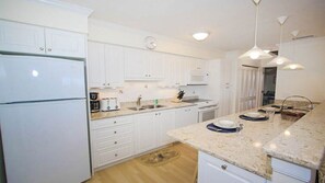 Fridge, microwave, oven, stovetop - Relax on your private deck with Gulf views Sanibel Island - Pet Friendly - Signal Inn 09 (Sanibel)