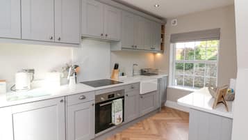 Fridge, electric kettle, toaster, cookware/dishes/utensils